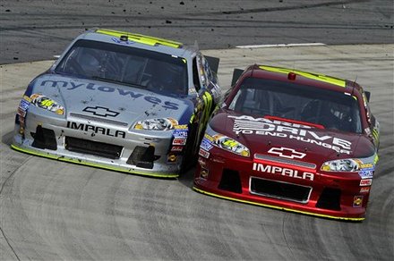 Auto  Race Racing on Race Closely Through Turn 4 During The Nascar Sprint Cup Series Auto